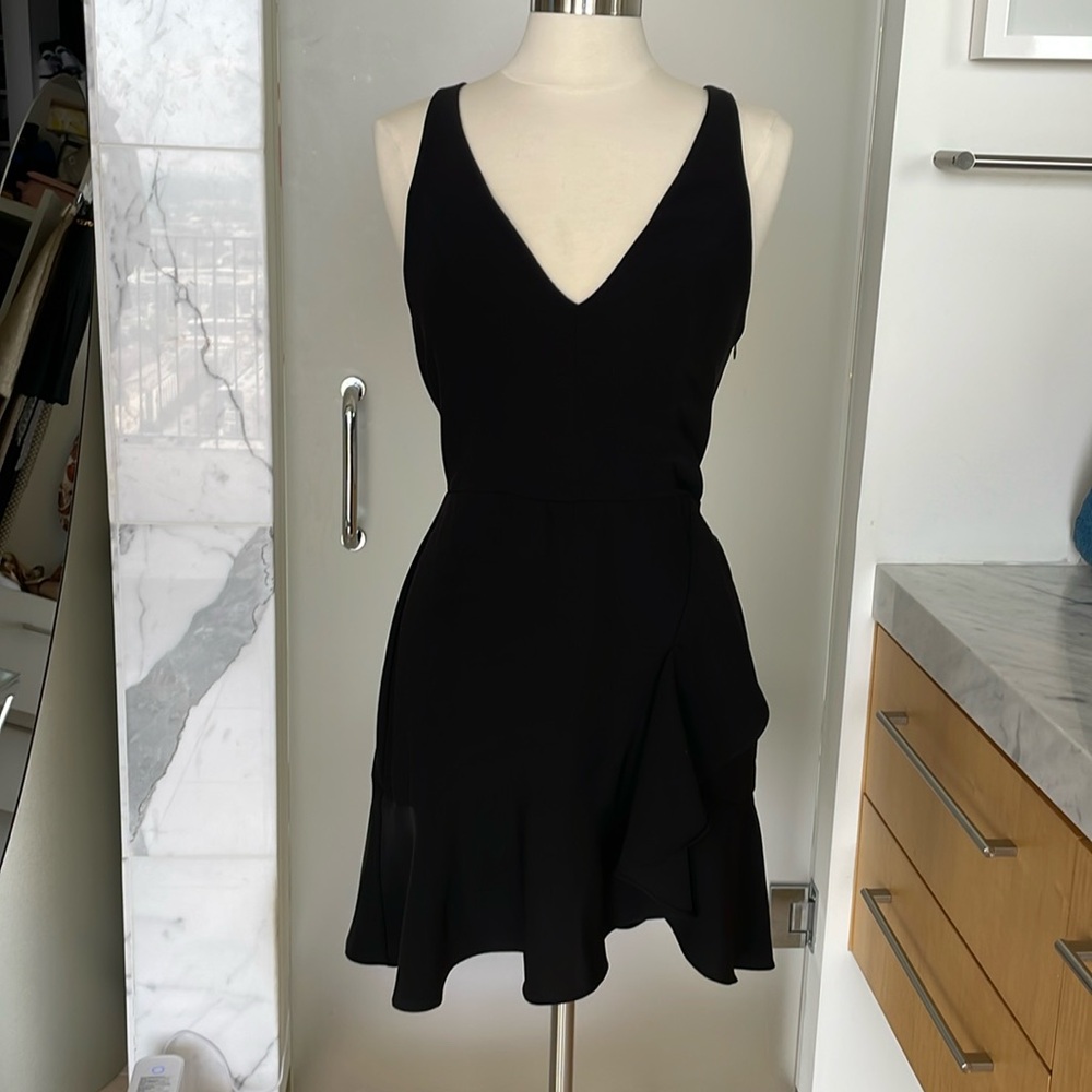 Amanda Uprichard black dress. Size large. Crisscross in back with cut out.  Cute